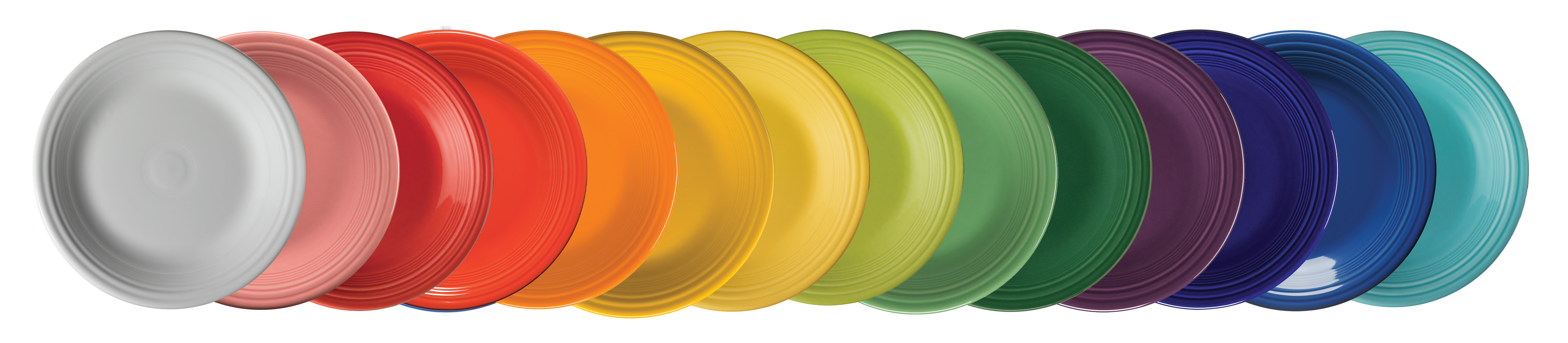 A horizontal stack of Fiesta's plates aligned in a colorful rainbow. 